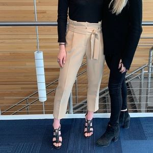 Tan trousers with tie belt